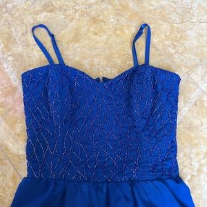 Bebe Blue Peplum top